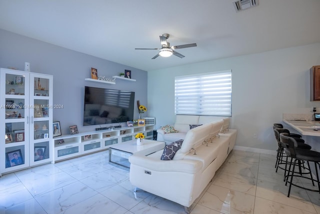 living room featuring ceiling fan