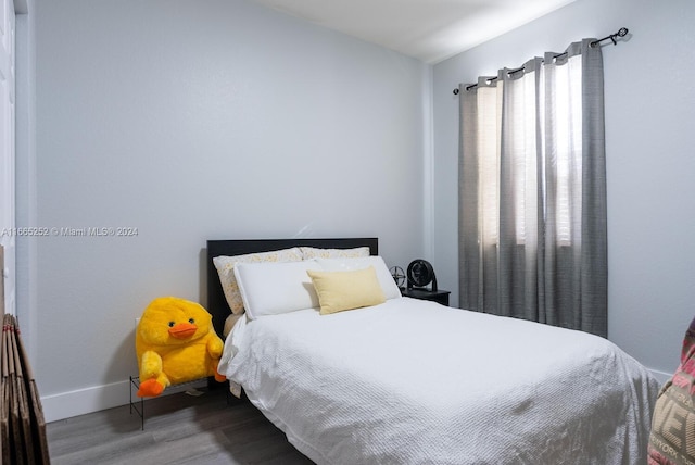 bedroom featuring wood-type flooring