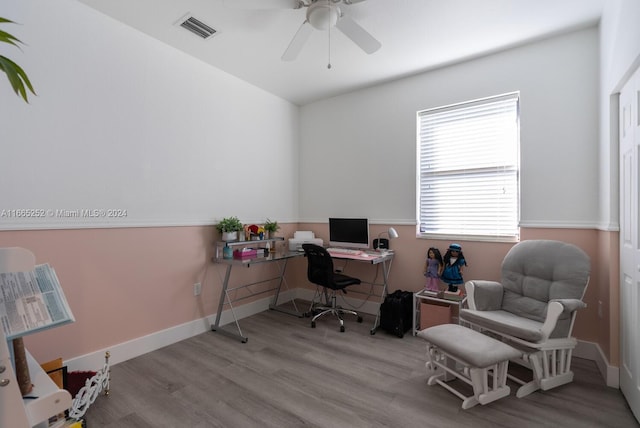 office featuring ceiling fan and light hardwood / wood-style flooring