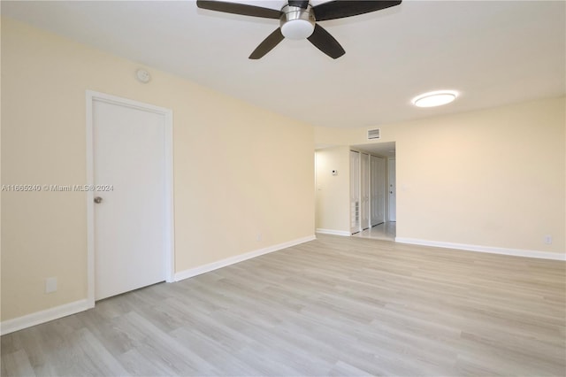 unfurnished room with light hardwood / wood-style floors and ceiling fan