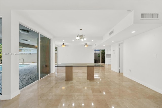 1769 Wa Kee Na Dr, Miami, FL 33133 - empty room with baseboards, visible vents, and ceiling fan with notable chandelier