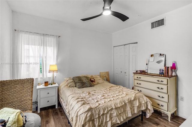 2615 Collins Ave Unit 21, Miami Beach, FL 33140 - bedroom with a closet, a ceiling fan, visible vents, and wood finished floors
