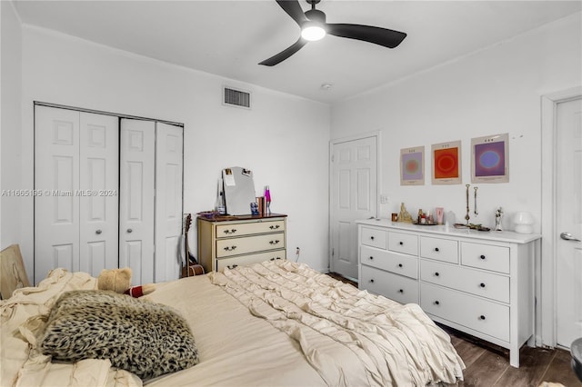 2615 Collins Ave Unit 21, Miami Beach, FL 33140 - bedroom with a closet, visible vents, ceiling fan, and dark wood-style floors