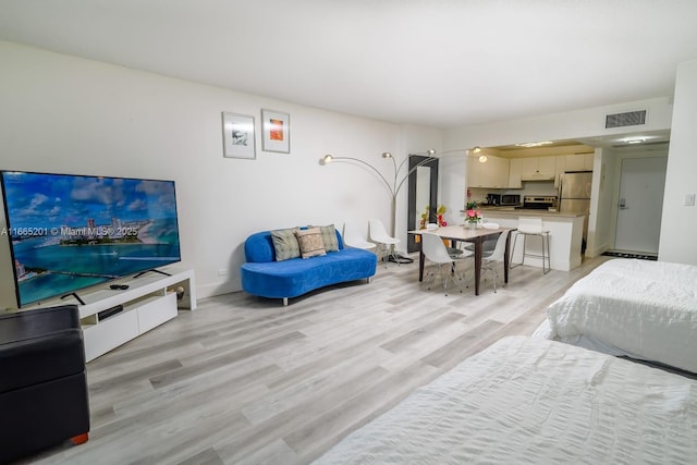 living room with light wood-type flooring