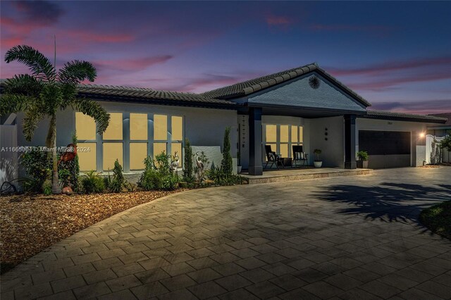 view of front of property with a garage