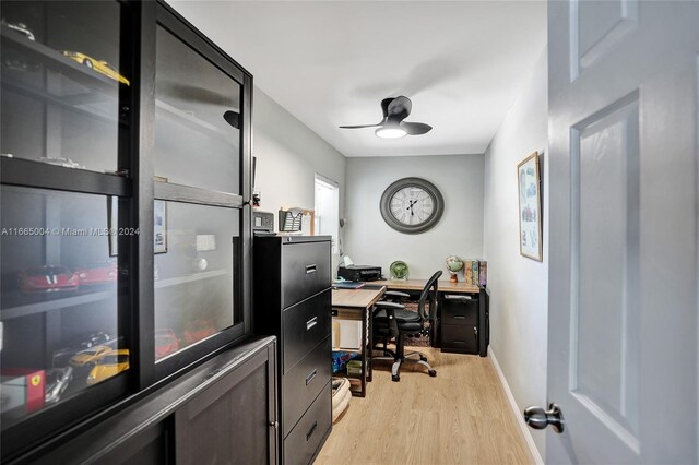 office space featuring ceiling fan and light hardwood / wood-style flooring