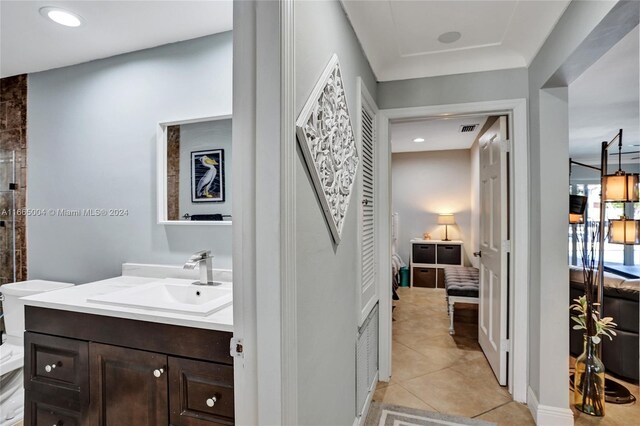 bathroom with vanity and tile patterned floors