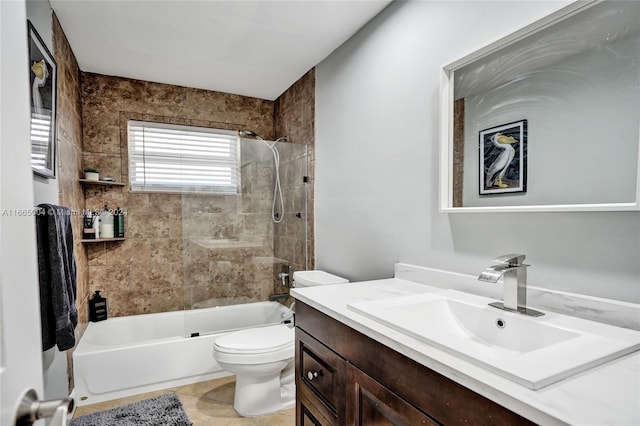 full bathroom with tiled shower / bath, vanity, tile patterned flooring, and toilet