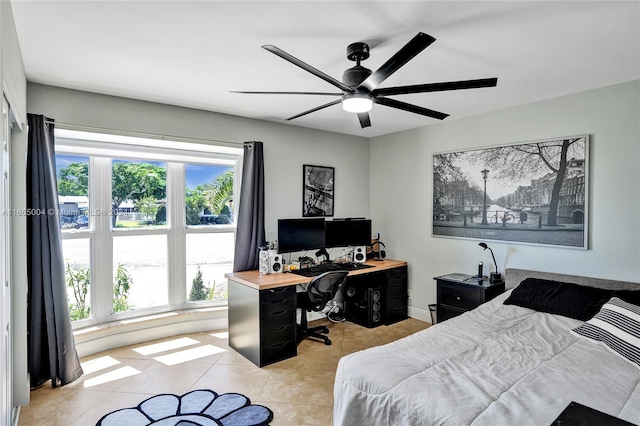 bedroom featuring ceiling fan and light tile patterned floors