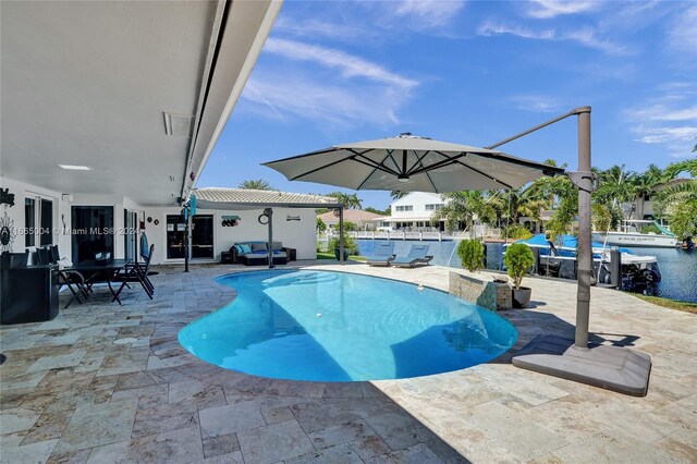 view of pool featuring a patio area