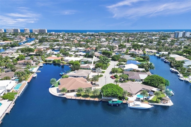 drone / aerial view with a water view