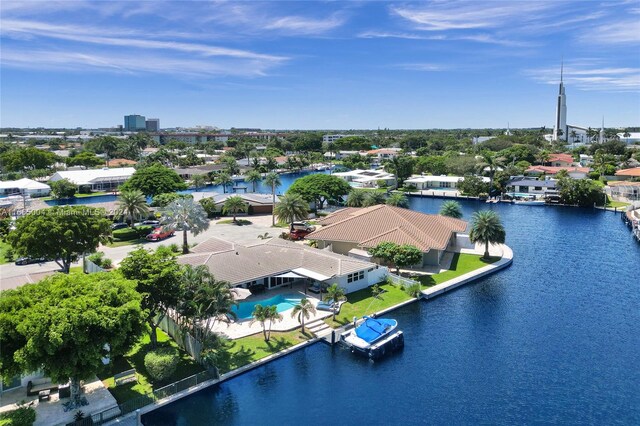 birds eye view of property featuring a water view