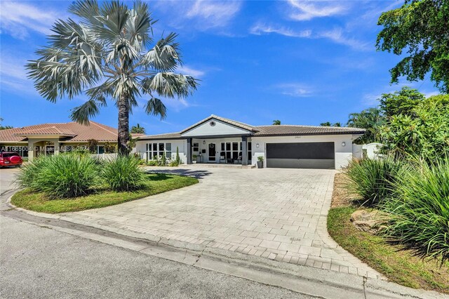 view of front of property featuring a garage