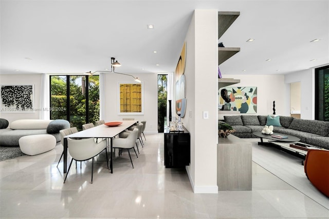 5327 N Bay Rd, Miami Beach, FL 33140 - dining area featuring plenty of natural light and baseboards
