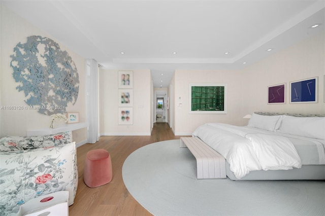 5327 N Bay Rd, Miami Beach, FL 33140 - bedroom featuring wood finished floors, recessed lighting, baseboards, and a raised ceiling