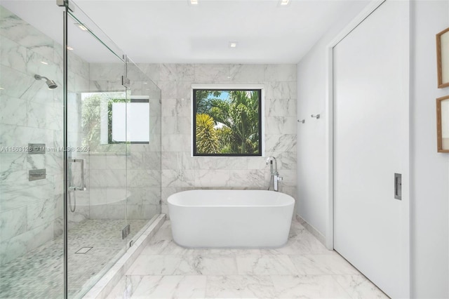 5327 N Bay Rd, Miami Beach, FL 33140 - bathroom featuring a soaking tub, marble tiled floors, and a shower stall
