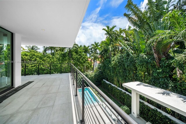 5327 N Bay Rd, Miami Beach, FL 33140 - balcony featuring view of pool