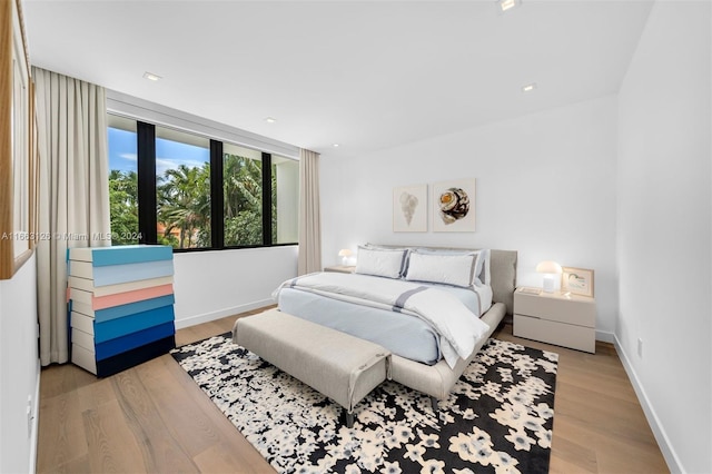 5327 N Bay Rd, Miami Beach, FL 33140 - bedroom with wood finished floors and baseboards
