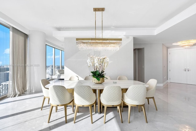 dining area with marble finish floor and baseboards