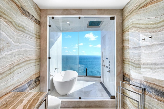 bathroom with a soaking tub