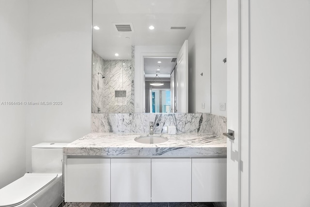 full bath featuring a shower, recessed lighting, visible vents, toilet, and vanity