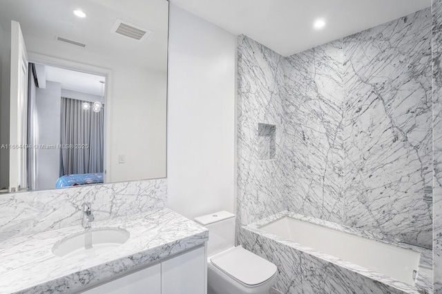 full bathroom featuring ensuite bathroom, toilet, a combined bath / shower with marble appearance, visible vents, and vanity