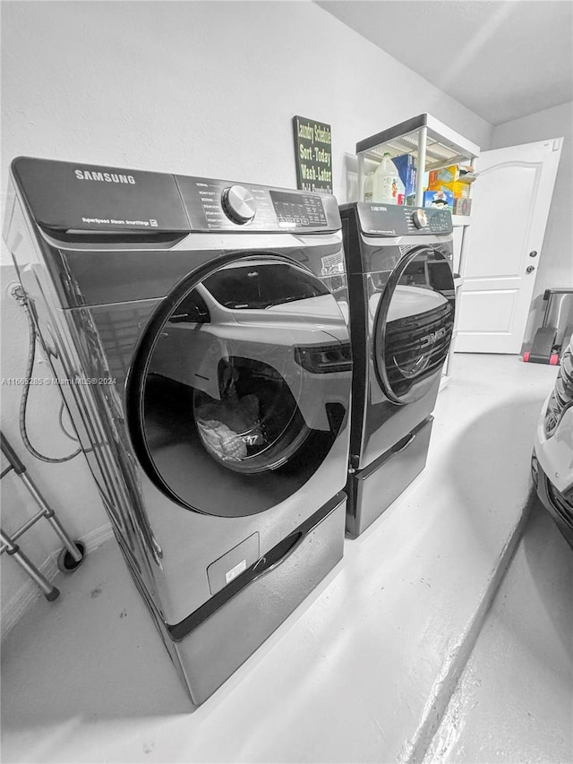 washroom featuring separate washer and dryer