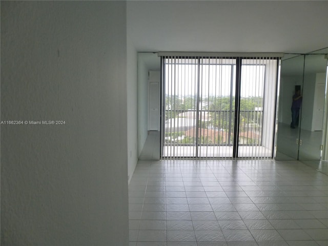 view of tiled spare room