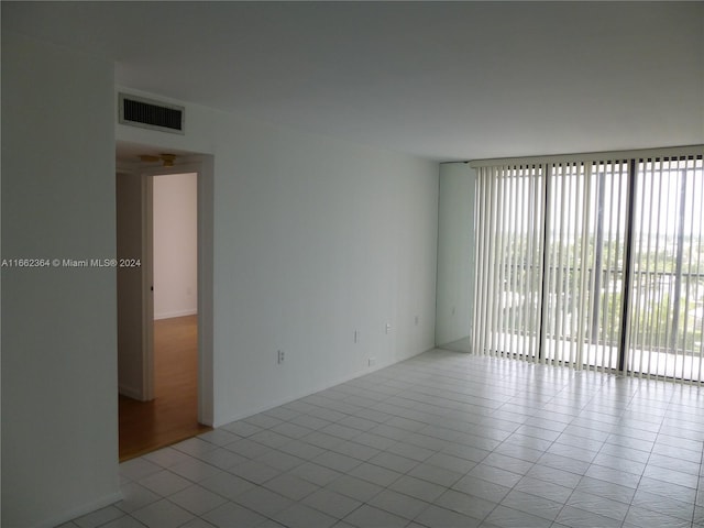 view of tiled spare room