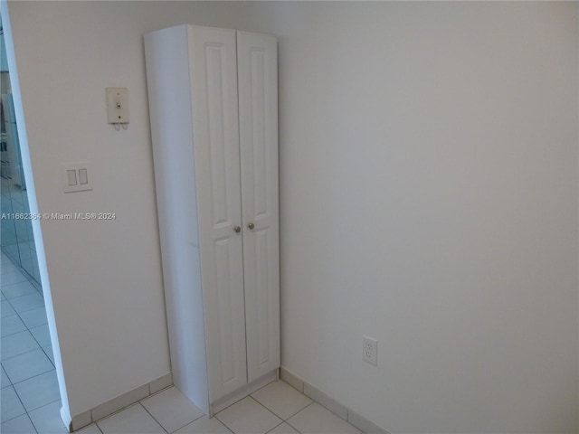 interior space featuring light tile patterned floors