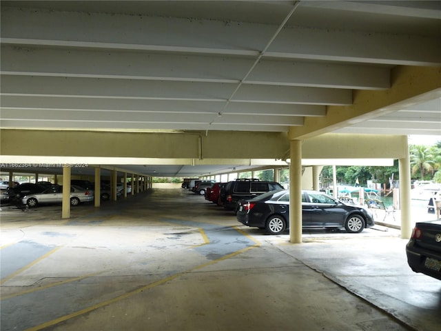 garage featuring a carport