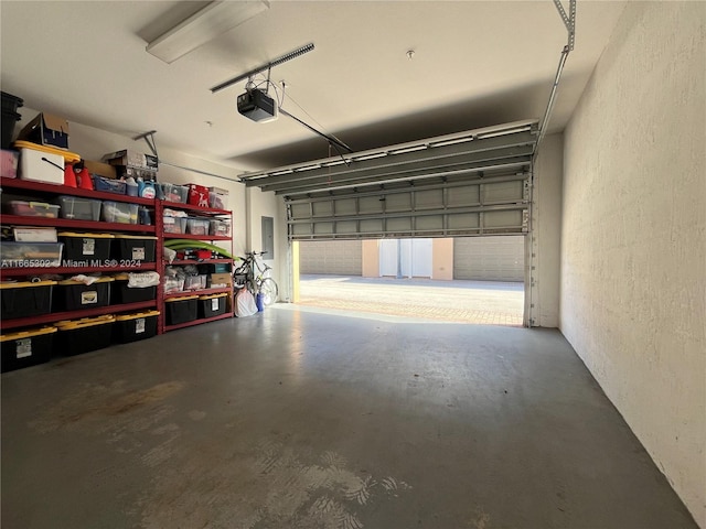 garage featuring a garage door opener