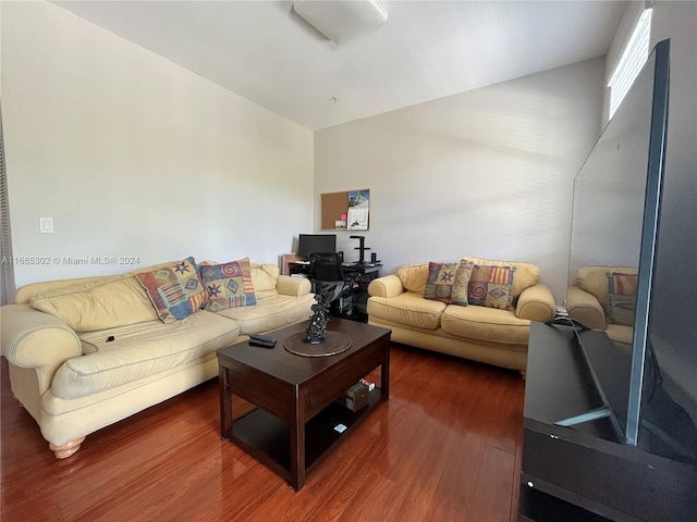 living room featuring dark hardwood / wood-style flooring