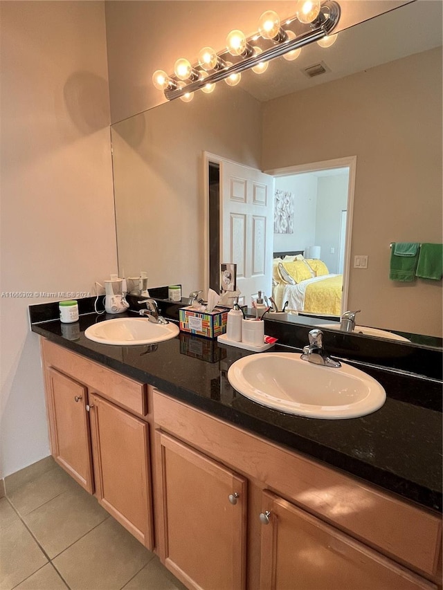 bathroom featuring vanity and tile patterned floors