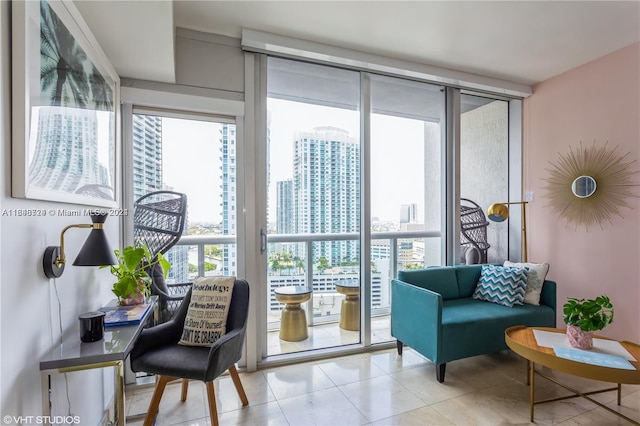 living area with a wall of windows