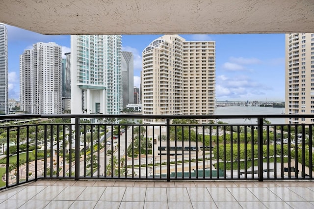 balcony featuring a water view