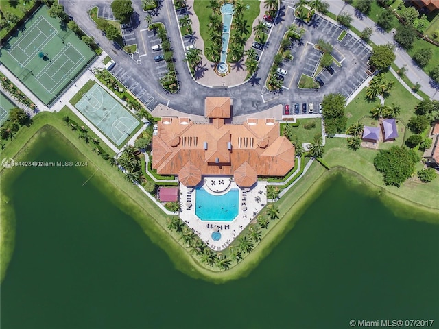 birds eye view of property featuring a water view