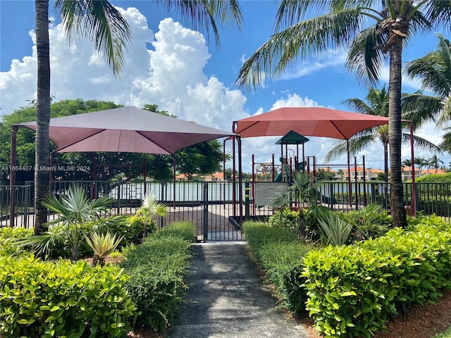 view of property's community with a playground