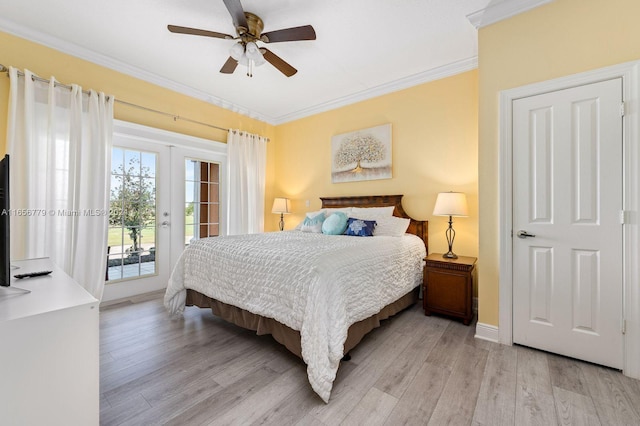 bedroom featuring ceiling fan, light wood-type flooring, crown molding, and access to outside