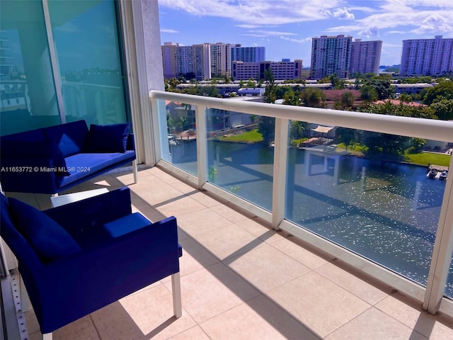 balcony featuring a water view