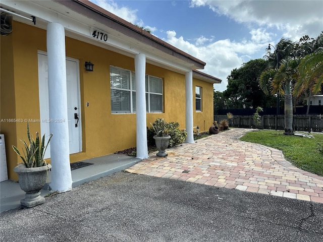 view of side of home featuring a patio area