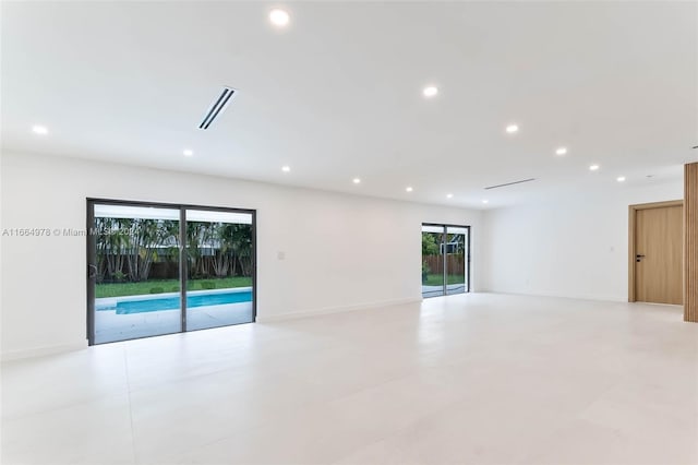 spare room featuring plenty of natural light