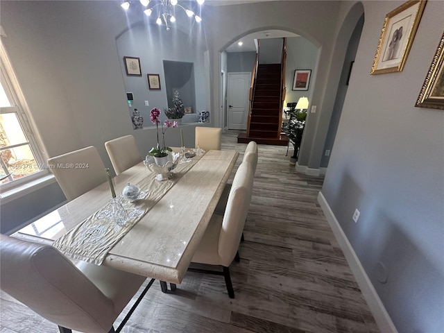 dining area with hardwood / wood-style floors