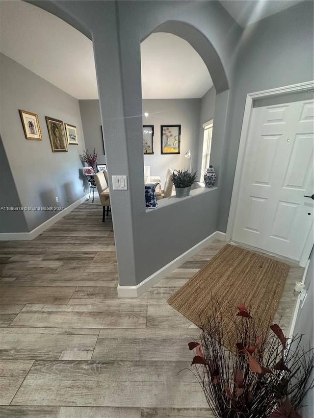 entryway with light hardwood / wood-style floors