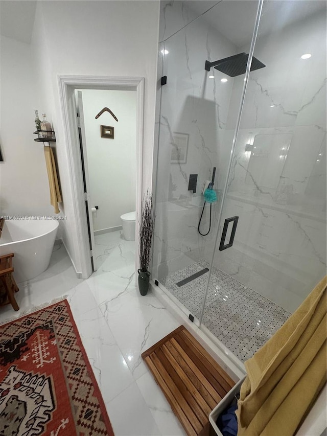 bathroom with independent shower and bath and toilet