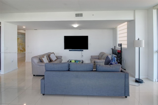 living room with light tile patterned floors