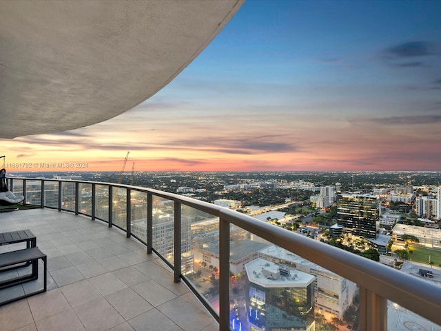 view of balcony at dusk