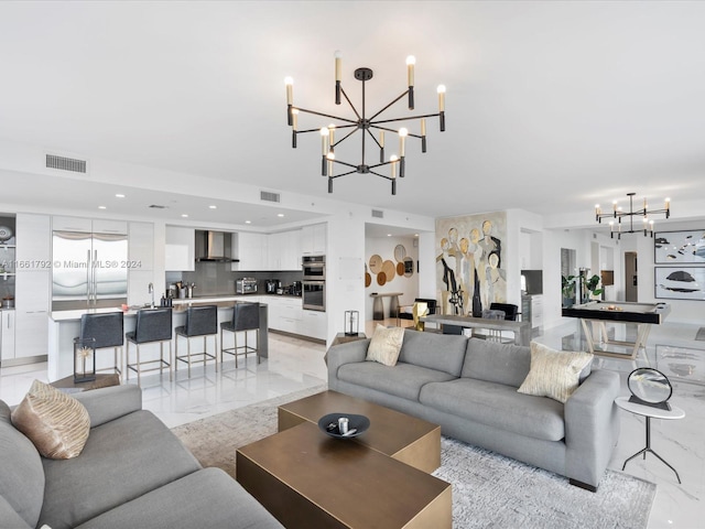 living room with a notable chandelier