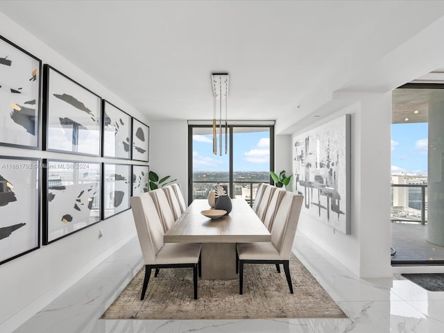 dining space with floor to ceiling windows