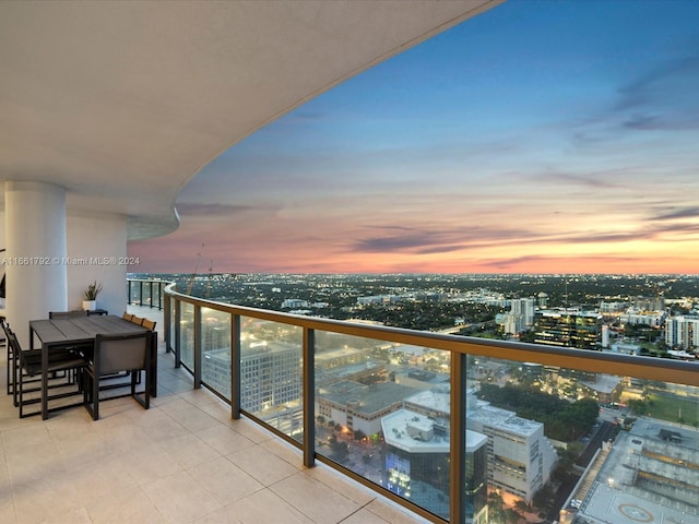 view of balcony at dusk